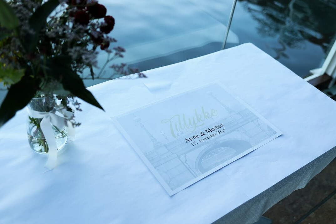 Photo albums and protective sleeves on a table