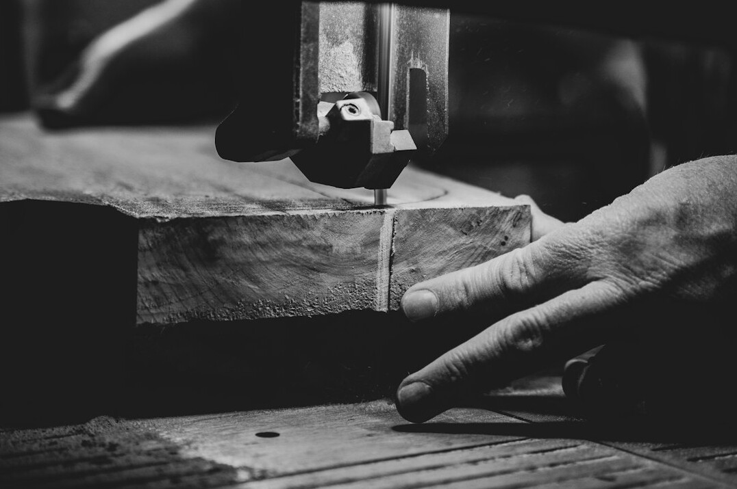 hand saw cutting wood