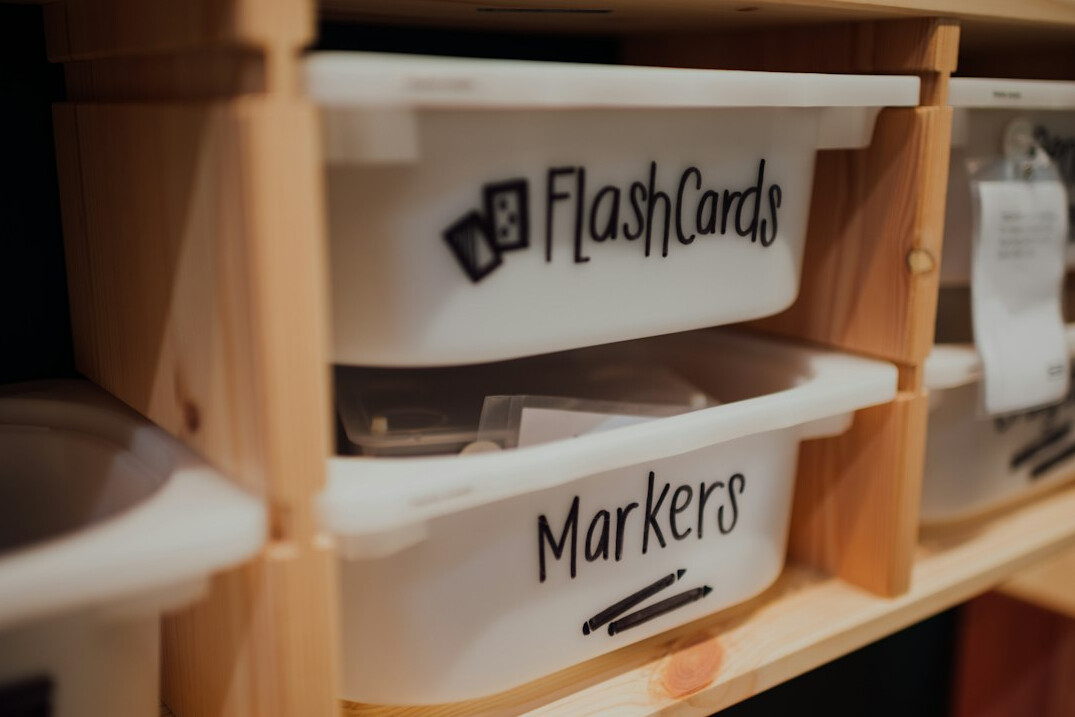 Tidy shelf with labeled storage boxes