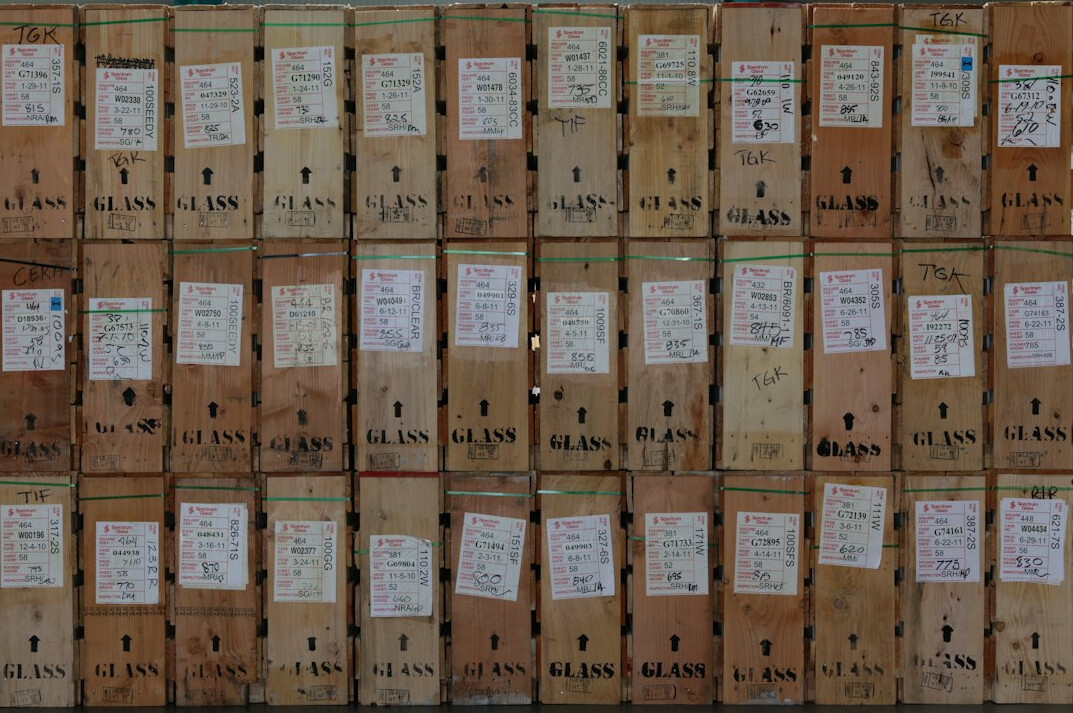 Archive boxes and folders with labeled collection items
