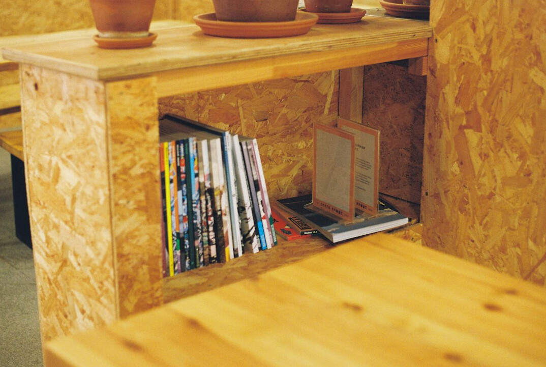 Quiet reading corner with bookshelves and an armchair